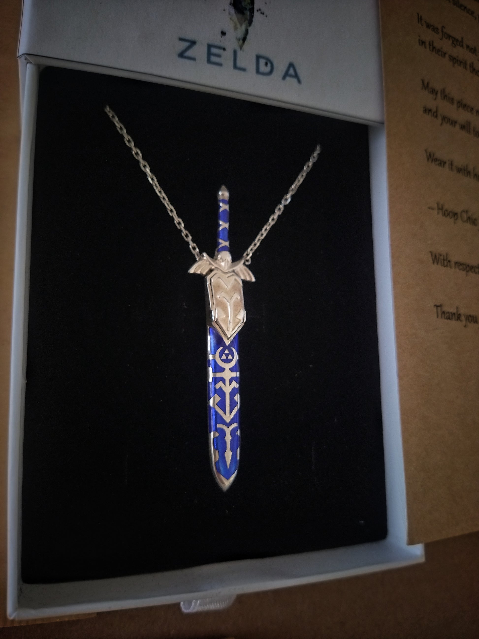 Sterling silver fantasy sword necklace inspired by legendary adventure stories. Detailed hero sword pendant for collectors, fantasy fans, and gamers.