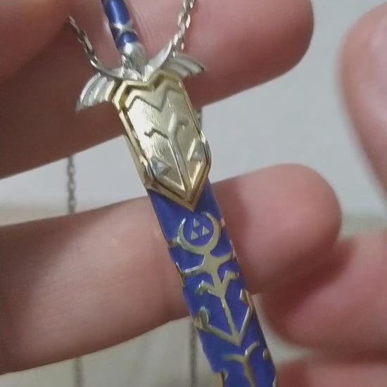 Sterling silver fantasy sword necklace inspired by legendary adventure stories. Detailed hero sword pendant for collectors, fantasy fans, and gamers.