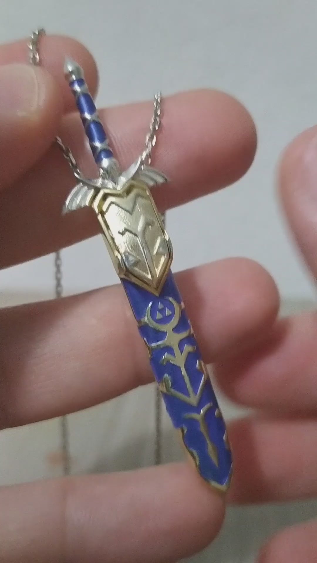 Sterling silver fantasy sword necklace inspired by legendary adventure stories. Detailed hero sword pendant for collectors, fantasy fans, and gamers.